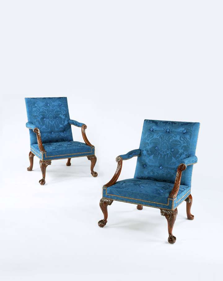 An Exceptional Pair of George II Period Carved Walnut 'Gainsborough' Armchairs Attributed to the Workshop of Giles Grendey